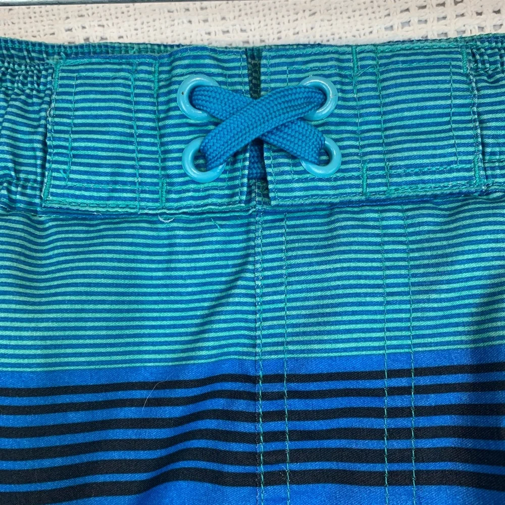 OT Revolution Boys M 8/10 Blue Striped Swim Trunks Mesh Lined Pockets Elastic